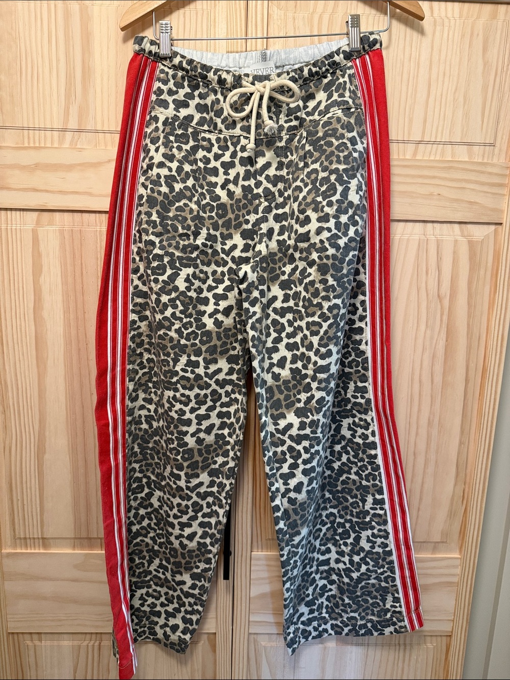 Veveret Leopard Print track pants with Red Side Stripes